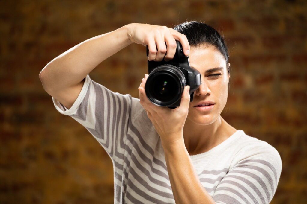 Caucasian female photographer