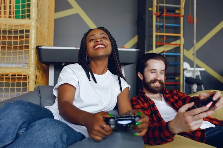 International couple playing a video games