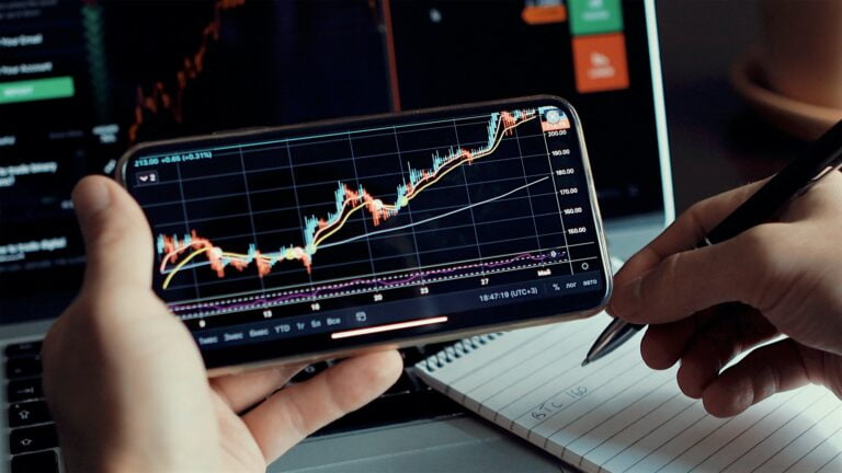 investment stockbroker stock market analysis data graph on smartphone